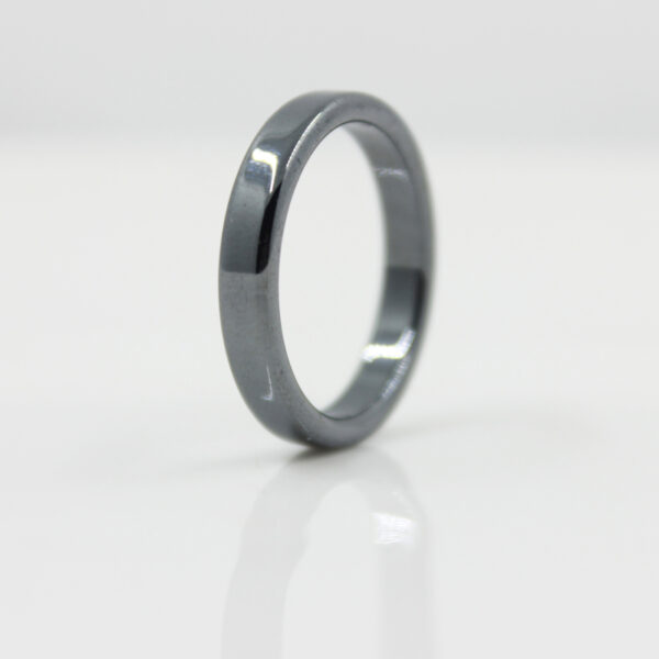 A smooth flat hematite ring 4 mm wide